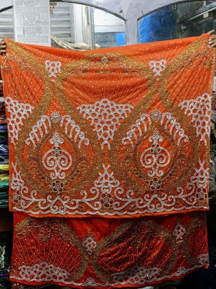NIGERAIN ORANGE COLOUR BEADED GEORGE FABRIC - Image 1