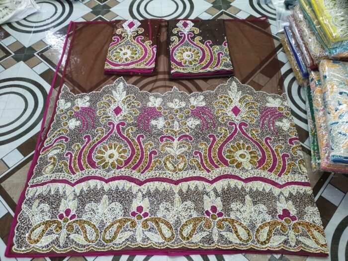 NIGERAIN BROWN COLOUR CRISTAL GEORGE FABRIC - Image 1
