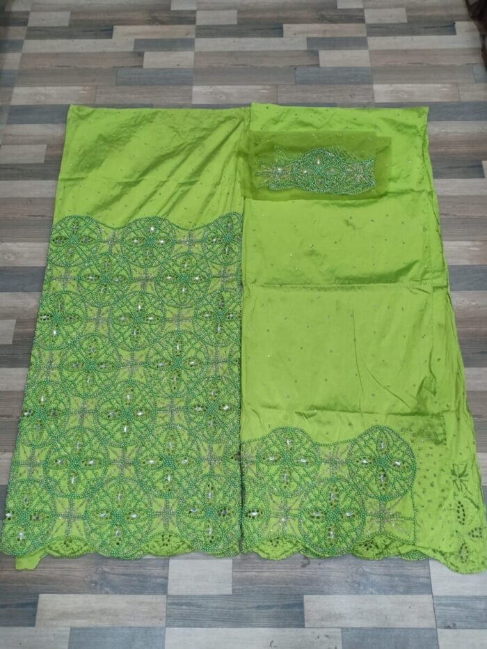 african light green beaded george fabric - Image 1