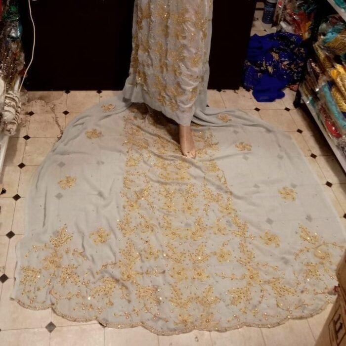 NIGERAIN WHITE COLOUR BEADED GEORGE FABRIC - Image 1