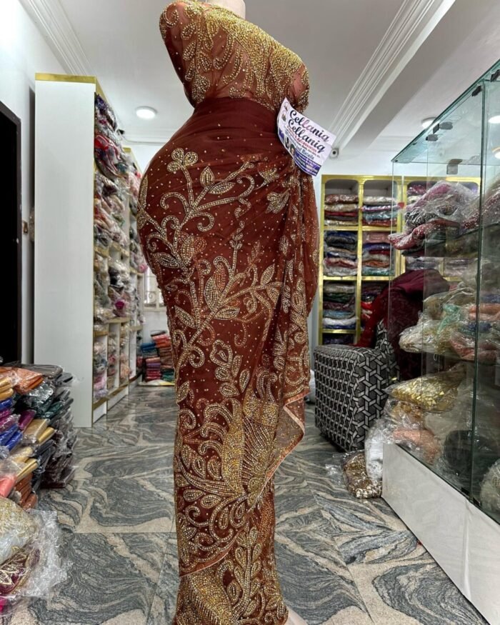 NIGERAIN BROWN COLOUR CRISTAL GEORGE FABRIC - Image 1