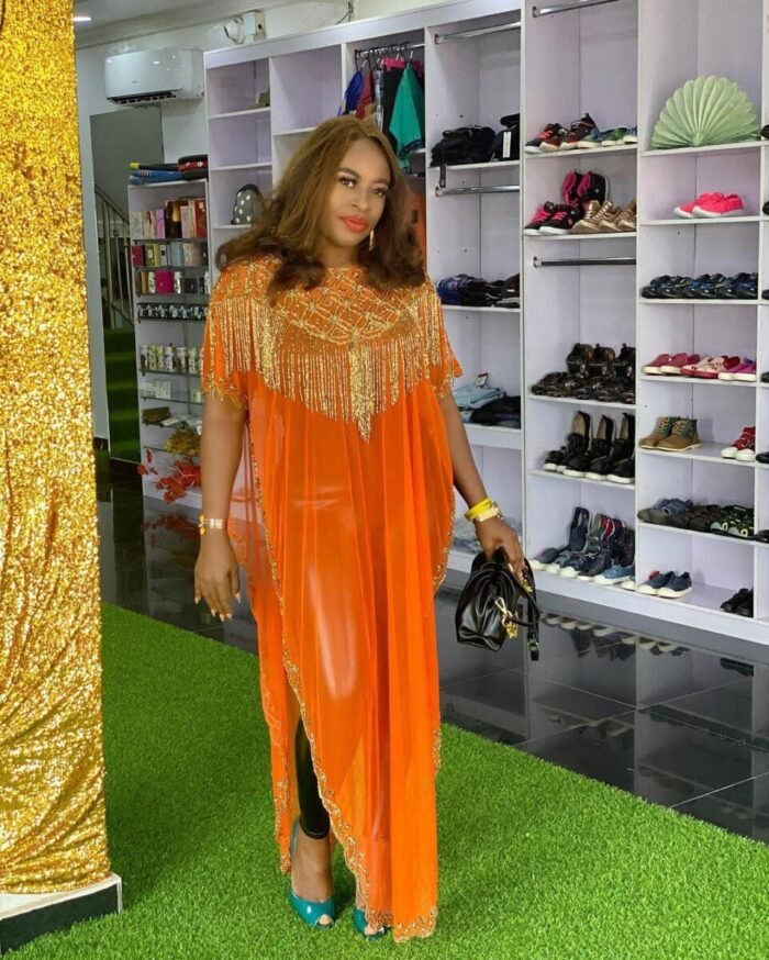 ORANGE COLOR LATEST TESSEL AFRICAN GOWN - Image 1